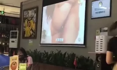 This is a great restaurant. It's doing well with a big screen showing videos of men, women and children having sex.
